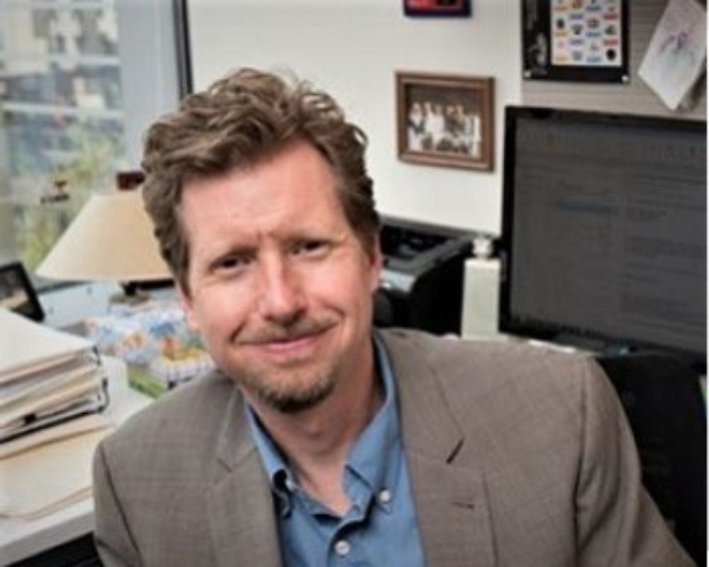 Jon Korfmacher, home visiting and early childhood intervention researcher, in his office